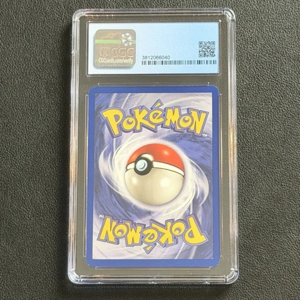 Pokemon Dark Machamp Non-Holo 1st Ed. 27/82 CGC 8.5 TCG Team Rocket 2000 WotC